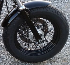 DK Custom Blacked Out Spokes on Your Harley - Black Spoke Covers Spoke Skins Sportster Dyna Softail Touring Street Powder Coat